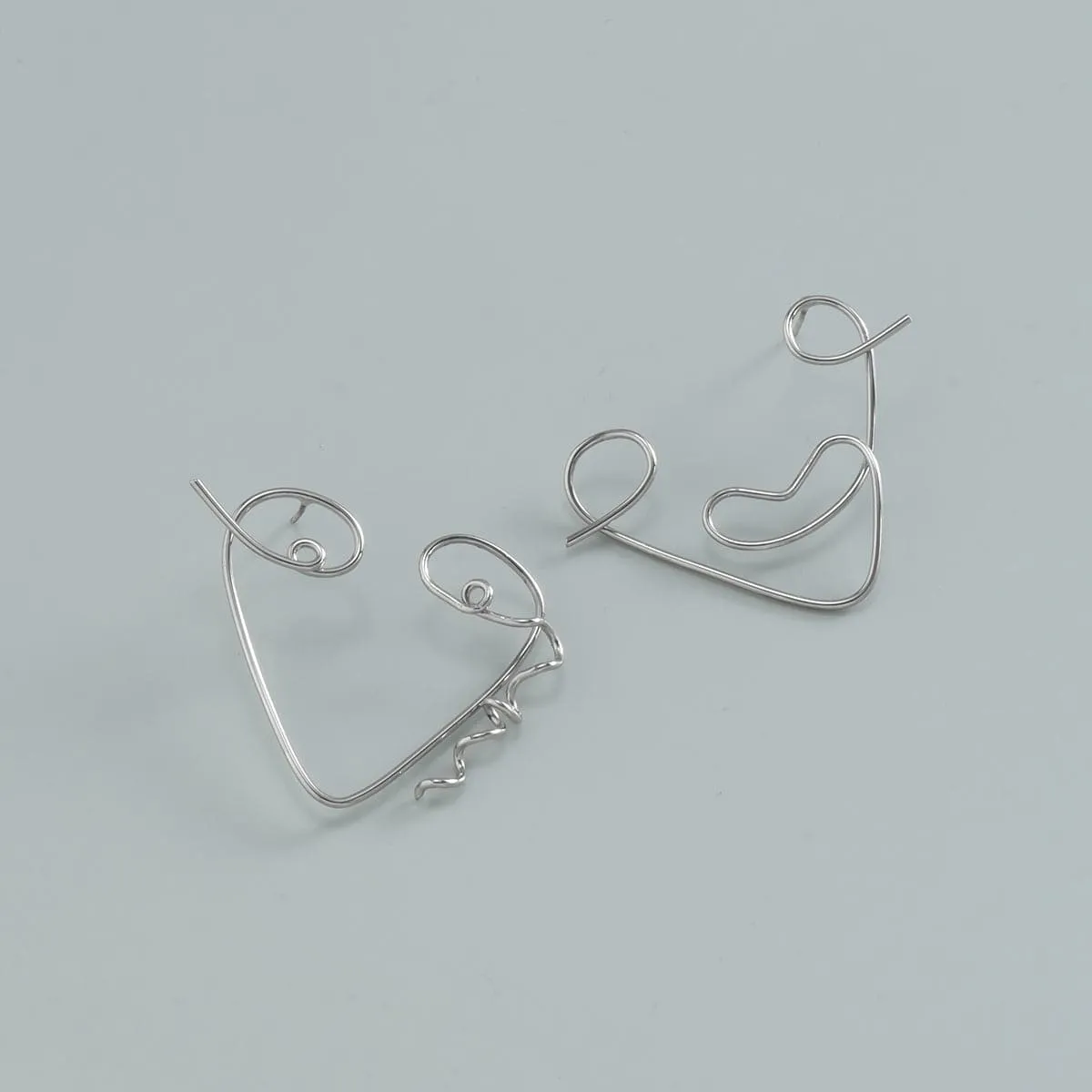 Silver-Plated Abstract Face Open-Triangle Drop Earrings