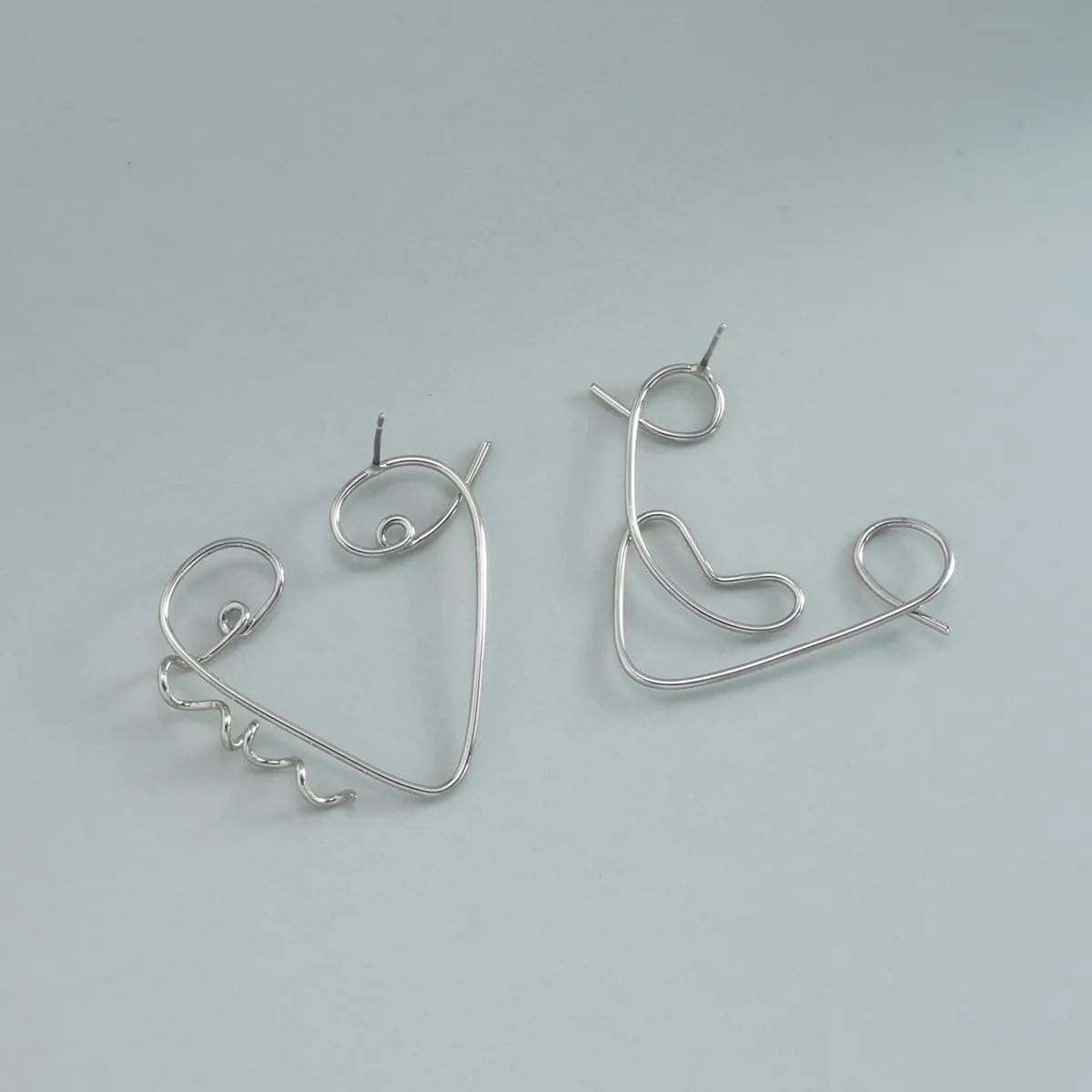 Silver-Plated Abstract Face Open-Triangle Drop Earrings